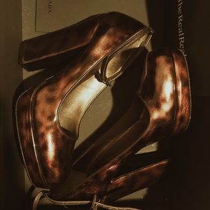 Prada Tortoiseshell Round-Toe Pumps